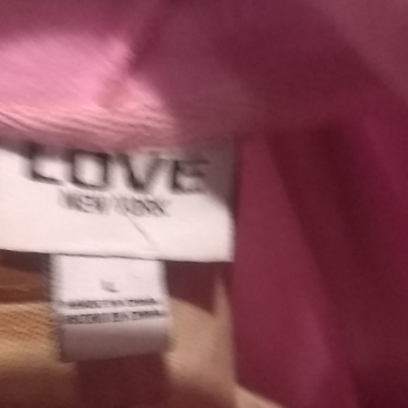 A pink hoodie with plush sleeves - Picture 3 of 3